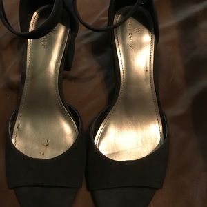 Open toed dress shoe with a back and ankle strap